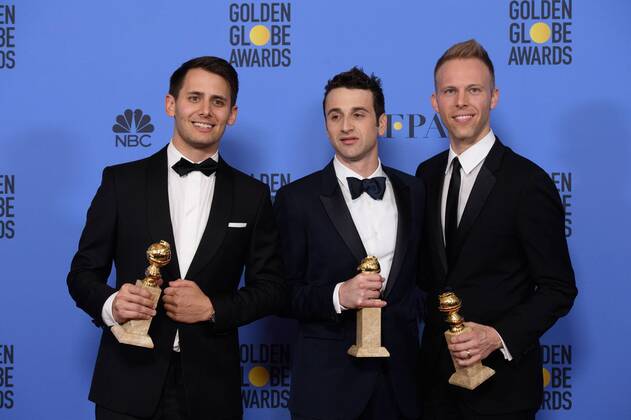 Jan 8, 2017 - Beverly Hills, California, U.S - After winning the category of BEST ORIGINAL SONG MOTION PICTURE for City of Stars for La La Land - music by: Justin Hurwitz; lyrics by: Benj Pasek, Justin Paul - pose with the award backstage in the press room at the 74th Annual Golden Globe Awards at the Beverly Hilton in Beverly Hills, CA on Sunday, January 8, 2017. Beverly Hills U.S - ZUMAz03_ 20170108_sha_z03_468