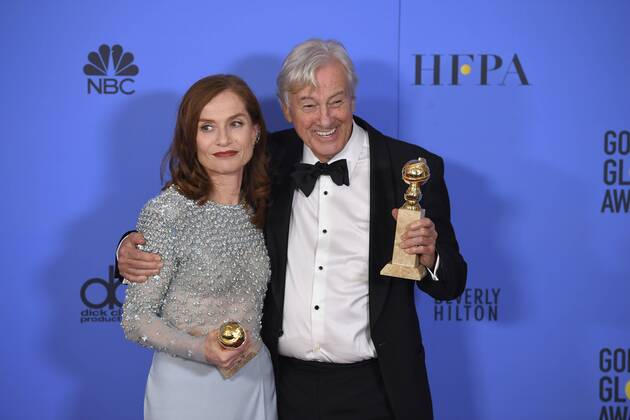 January 8, 2017 - Los Angeles, California, U.S. - ISABELLE HUPPERT and PAUL VERHOEVEN celebrate their win backstage for ELLE at the 74th Annual Golden Globe Awards, at The Beverly Hilton in Beverly Hills. Los Angeles U.S. - ZUMAz03_ 20170108_zbp_z03_429