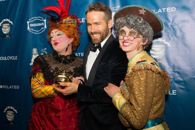 Actor Ryan Reynolds (C) poses with his Pudding Pot trophy with Harvard students Dylan Peterson (L) and Dan Milaschewski in costume, after Reynolds was awarded the Harvard University Hasty Pudding Theatricals 2017 Man of the Year inside Farkas Hall in Cambridge, Massachusetts on February 3, 2017.  BOS20170203008 MATTHEWxHEALEY