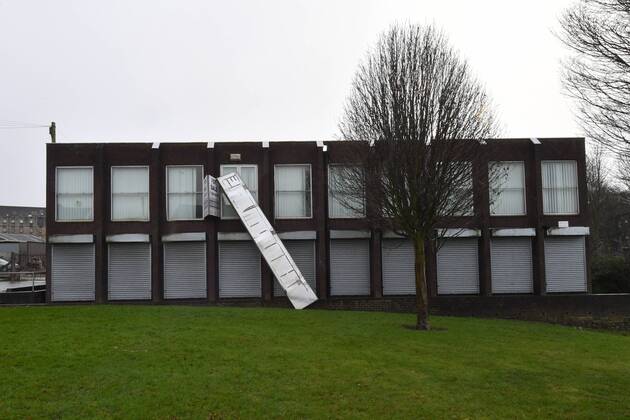 . 12 02 2017. Manchester, United Kingdom. Manchester Storms General view of a large sign hanging from a building following heavy winds in Stalybridge, Greater Manchester . xAnthonyxDevlinx xi-Imagesx IIM-14372-0006