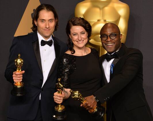 Producer Jeremy Kleiner (L), producer Adele Romanski (C), and writer director Barry Jenkins, winners of the award for Best Picture for Moonlight , appear backstage during the 89th annual Academy Awards at Loews Hollywood Hotel in the Hollywood section of Los Angeles on February 26, 2017.  LAP201702261069 JIMxRUYMEN