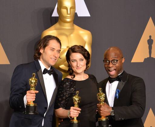 Producer Jeremy Kleiner (L), producer Adele Romanski (C), and writer director Barry Jenkins, winners of the award for Best Picture for Moonlight , appear backstage during the 89th annual Academy Awards at Loews Hollywood Hotel in the Hollywood section of Los Angeles on February 26, 2017.  LAP201702261071 JIMxRUYMEN