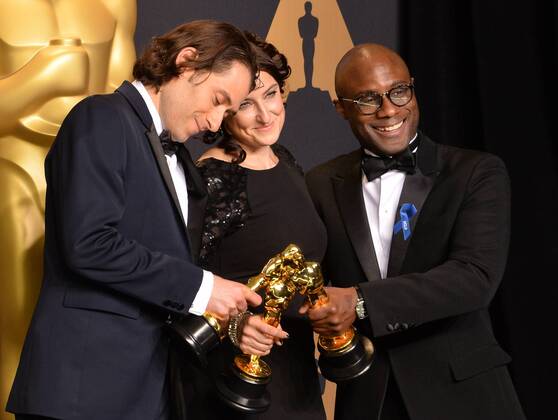 Producer Jeremy Kleiner (L), producer Adele Romanski (C), and writer director Barry Jenkins, winners of the award for Best Picture for Moonlight , appear backstage during the 89th annual Academy Awards at Loews Hollywood Hotel in the Hollywood section of Los Angeles on February 26, 2017.  LAP201702261072 JIMxRUYMEN