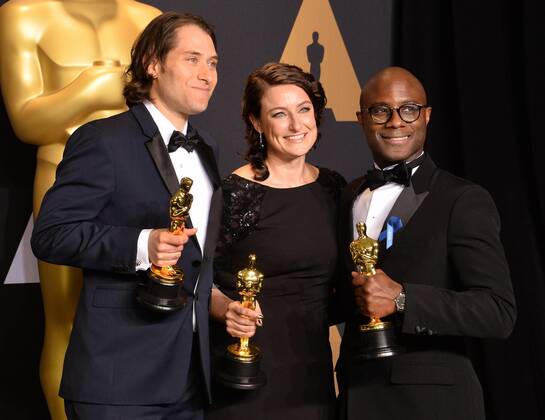 Producer Jeremy Kleiner (L), producer Adele Romanski (C), and writer director Barry Jenkins, winners of the award for Best Picture for Moonlight , appear backstage during the 89th annual Academy Awards at Loews Hollywood Hotel in the Hollywood section of Los Angeles on February 26, 2017.  LAP201702261074 JIMxRUYMEN