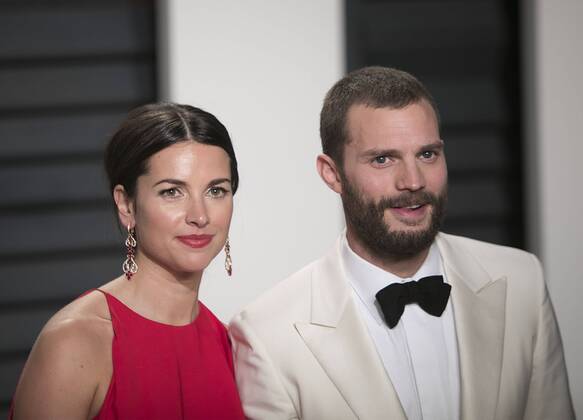 February 27, 2017 - Beverly Hills, California, U.S - Amelia Warner, Jamie Dornan on the red carpet at the 2017 Vanity Fair Oscar Party held at the Wallis Annenberg Center in Beverly Hills, California, Sunday February 26, 2017. JAVIER ROJAS PI Beverly Hills U.S. - ZUMAp124 20170227_zaa_p124_126 Copyright: xPrensaxInternacionalx