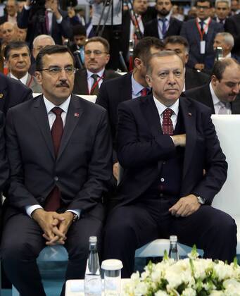 Turkish President Recep Tayyip Erdogan meets with the members of Chamber of Merchants and Craftsmen at Bagcilar city of Istanbul, 19th of March, 2017. 15651918