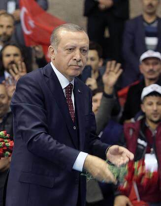 Turkish President Recep Tayyip Erdogan meets with the members of Chamber of Merchants and Craftsmen at Bagcilar city of Istanbul, 19th of March, 2017. 15651939