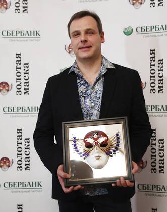MOSCOW, RUSSIA - APRIL 19, 2017: Russian conductor Pavel Klinichev poses with an award for Ballet Best Conductor for Ondine, Bolshoi Theatre, Moscow, at the 2017 Golden Mask award ceremony at the Stanislavsky and Nemirovich-Danchenko Moscow Music Theatre. Artyom Geodakyan TASS  TS048DE6