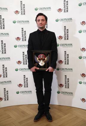 MOSCOW, RUSSIA - APRIL 19, 2017: Russian choreographer Anton Pimonov pose with an award for Ballet-Contemporary Dance Best Balletmaster Best Choreographer for Violin Concerto No 2, Mariinsky Theatre, St Petersburg, at the 2017 Golden Mask award ceremony at the Stanislavsky and Nemirovich-Danchenko Moscow Music Theatre. Artyom Geodakyan TASS  TS048DEA