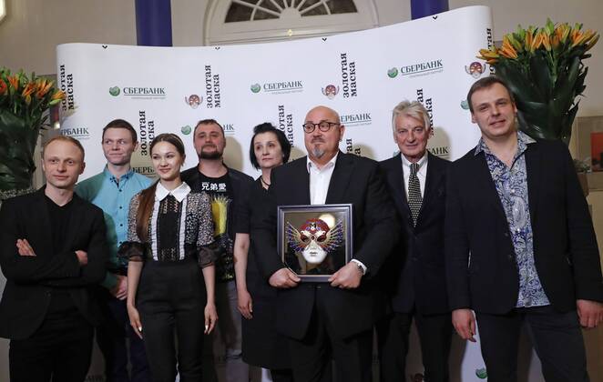 MOSCOW, RUSSIA - APRIL 19, 2017: Russian ballet dancer Igor Bulytsyn (L) who has received an award for Ballet-Contemporary Dance Best Actor for Romeo and Juliet, Opera and Ballet Theatre, Yekaterinburg, and Andrei Shishkin (C), director of the Yekaterinburg Opera and Ballet Theatre, with an award for Ballet Best Production for Romeo and Juliet at the 2017 Golden Mask award ceremony at the Stanislavsky and Nemirovich-Danchenko Moscow Music Theatre. Artyom Geodakyan TASS  TS048DFC