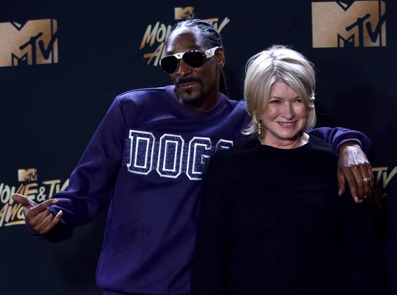 Snoop Dogg and Martha Stewart appear backstage during the MTV Movie & TV Awards at the Shrine Auditorium in Los Angeles on May 7, 2017. It will be the 26th edition of the awards, and will for the first time present honors for work in television as well as cinema.  LAP20170507593 CHRISTINExCHEW