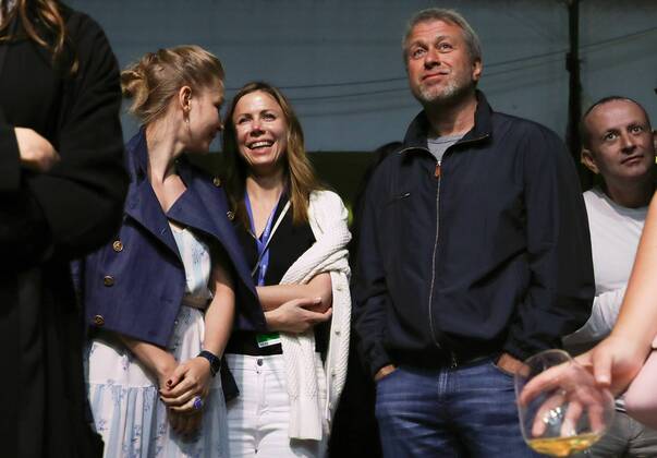 SOCHI, RUSSIA - JUNE 13, 2017: Actress Yulia Peresild, Polina Deripaska, chairperson of the Board of Directors at Forward Media Group Publishing House, and Russian businessman Roman Abramovich (L-R) attend the Zorkiy & the Ladies concert at the 28th Kinotavr Film Festival. Vyacheslav Prokofyev TASS  TS052B1B