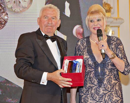 Ivana Trump, right, a former wife of the incumbent U.S. president, internationally popular Czech pop star Karel Gott, physiotherapist Pavel Kolar and sports manager Miroslav Cernosek are presented with the Ambassador of the Czech Republic title, a new award launched by the Spolecnost CZECH TOP group at Prague Castle, on Wednesday, June 21, 2017. The award goes to personalities whose professional successes have contributed to the Czech Republic s international fame. At left is Jan Struz, representative of the CZECH TOP group. (CTKxPhoto RenexFluger) CTKPhotoF201706220917901 