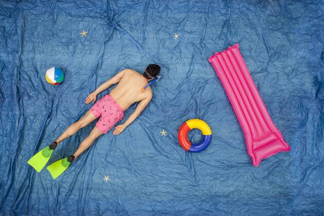 Man snorkelling in the sea model released Symbolfoto  BAEF01487