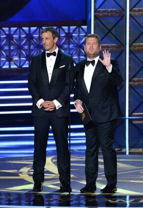 TV personalities Seth Meyers (L) and James Corden onstage during the 69th annual Primetime Emmy Awards at Microsoft Theater in Los Angeles on September 17, 2017.  LAP201709170175 JIMxRUYMEN