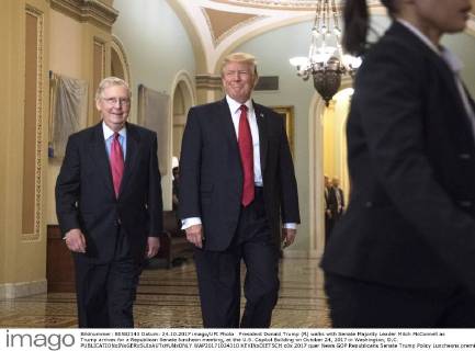 President Donald Trump (R) walks with Senate Majority Leader Mitch McConnell as Trump arrives for a Republican Senate luncheon meeting, at the U.S. Capitol Building on October 24, 2017 in Washington, D.C.  WAP20171024310 KEVINxDIETSCH
