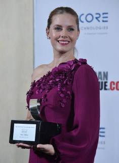 Actress Amy Adams holds the American Cinematheque Award during a photo-op at the entertainment industries annual gala at the Beverly Hilton Hotel in Beverly Hills, California on November 10, 2017. Adams was honored as an extraordinary artist in the entertainment industry currently making a significant contribution to the art of the moving picture.  LAP2017111003 JIMxRUYMEN