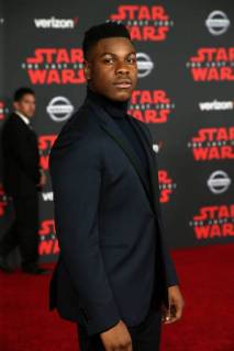 LOS ANGELES, CA - DECEMBER 9: John Boyega at the World Premiere of LucasfilmÕs Star Wars: The Last Jedi at The Shrine Auditorium in Los Angeles, California on December 9, 2017. Copyright: xFayexSadoux