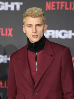 WESTWOOD, CA - DECEMBER 13: Machine Gun Kelly, at Premiere Of Netflix s Bright at The Regency Village Theatre, In Hollywood, California on December 13, 2017. Copyright: xFayexSadoux