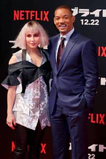 (L to R) Actress Noomi Rapace and actor Will Smith, pose for the cameras during the Japan premiere for the movie Bright on December 19, 2017, Tokyo, Japan. Smith, and Rapace alongside actor Joel Edgerton and director David Ayer, received a warm welcome from the Japanese fans at the event. The film will be released globally on Netflix on December 22. (gxta_brightjp010)