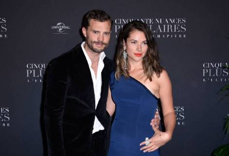 Fifty Shades of Grey 3 Premiere in Paris Jamie Dornan ( acteur ) et sa femme Amelia Warner lors du photocall pour l avant premiere du film 50 NUANCES PLUS CLAIRES a Paris CELEBRITES : Avant premiere du film 50 NUANCES PLUS CLAIRES - Paris - 06 02 2018 FedericoPestellini Panoramic