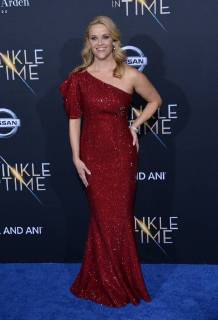 Cast member Reese Witherspoon attends the premiere of the sc-fi motion picture fantasy A Wrinkle in Time at the El Capitan Theatre in the Hollywood section of Los Angeles on February 26, 2018. Storyline: After the disappearance of her scientist father, three peculiar beings send Meg, her brother, and her friend to space in order to find him.  LAP2018022624 JIMxRUYMEN