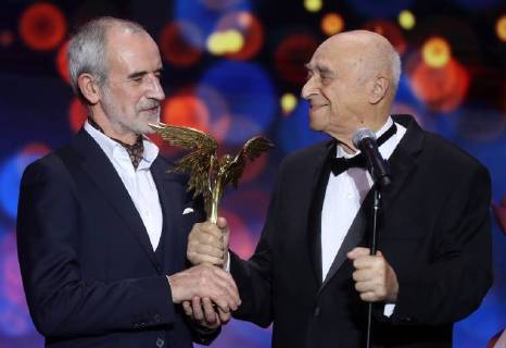 MOSCOW REGION, RUSSIA â€“ APRIL 1, 2018: Vakhtangov Theatre s Artistic Director Rimas Tuminas (L) and actor Vladimir Etush, the winner of a special prize Honour and Dignity , at the 31st Nika Film Award Ceremony, at the Vegas City Hall. Vyacheslav Prokofyev TASS  TS07A33D