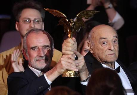 MOSCOW REGION, RUSSIA â€“ APRIL 1, 2018: Vakhtangov Theatre s Artistic Director Rimas Tuminas (L) and actor Vladimir Etush, the winner of a special prize Honour and Dignity , at the 31st Nika Film Award Ceremony, at the Vegas City Hall. Vyacheslav Prokofyev TASS  TS07A33F