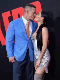 Cast member John Cena (L) and his wife, wrestler Nikki Bella attend the premiere of the motion picture comedy Blockers at the Regency Village Theatre in the Westwood section of Los Angeles on April3, 2018. Storyline: Three parents try to stop their daughters from having sex on Prom night.  LAP2018040354 JIMxRUYMEN
