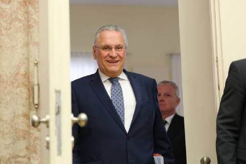 April 5, 2018 - Munich, Bavaria, Germany - Joachim Herrmann enters the room, in Munich, Germany, on April 5, 2018. The minister of interiour Joachim Herrmann and the President of the Verfassungsschutz ( Secret Service). They talked about Islamism, Right-wing extremism, left-wing extremism and cyber crminality. Munich Germany - ZUMAn230 20180405_zaa_n230_088 Copyright: xAlexanderxPohlx