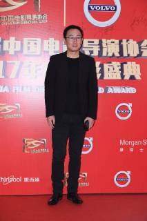 Chinese filmmaker Lu Chuan poses as he arrives on the red carpet for 9th China Film Directors Guild Award in Beijing, China, 21 April 2018. Zhao Wei, Zhou Xun dress up for 9th China Film Directors Guild Award in Beijing  pbu789351_16
