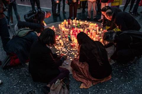 April 27, 2018 - Barcelona, Catalonia, Spain - People seen lighting candles in the center of the square catalunya in memory of the 1050 days in prison of the Catalan political prisoners. A hundred people have recalled that Catalan political prisoners have been in prison for 1050 days lighting the same number of candles in the Plaza Catalunya in Barcelona Barcelona Spain - ZUMAs197 20180427_zaa_s197_090 Copyright: xPacoxFreirex