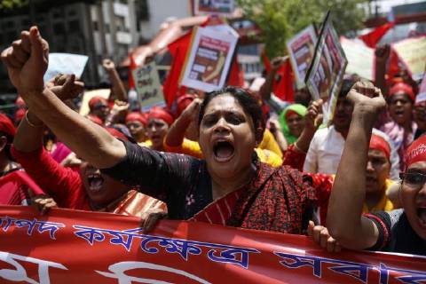April 30, 2018 - Dhaka, Bangladesh - Garment workers shout slogans during rally to mark May Day or International Workers Day in Dhaka. Dhaka Bangladesh - ZUMAh143 20180430_zap_h143_012 Copyright: xMDxMehedixHasanx