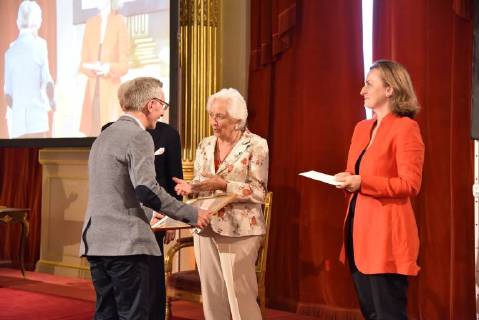 Queen Paola of Belgium (C) and Princess Claire of Belgium (R) pictured during a ceremony for the Queen Paola Award 2017-2018 (Koningin Paolaprijs - Prix Reine Paola) for education, at the royal castle in Laken Laeken, Brussels, Wednesday 30 May 2018.  CAMILLExDELANNOIS 05356508