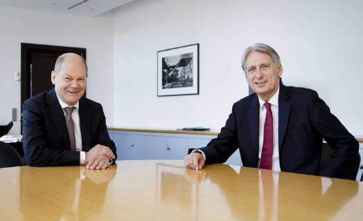 Bundesfinanzminister Olaf Scholz (l), SPD, trifft den britischen Schatzkanzler Philip Hammond, 08.06.2018, Berlin. Berlin Germany Copyright: xIngaxKjerx