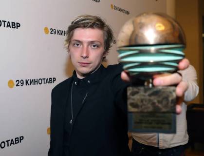 SOCHI, RUSSIA - JUNE 10, 2018: Director Alexander Gorchilin holds his award for the best debut for his film Acid at the closing ceremony of the 29th Kinotavr Film Festival. Vyacheslav Prokofyev TASS  TS0836B5
