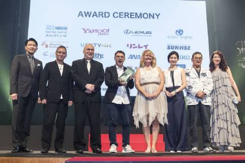 Singaporean director Yee Wei Chai (C) receives the Grand Prix (George Lucas Award) for his film Benjamin s Last Day At Katong Swimming Complex during the Short Shorts Film Festival & Asia 2018 (SSFF) Award Ceremony at Jingu Kaikan on June 17, 2018, Tokyo, Japan. SSFF is one of Asia s largest short film festivals held in Tokyo from June 4 to 24.  (gxta_SSFFawrd012)