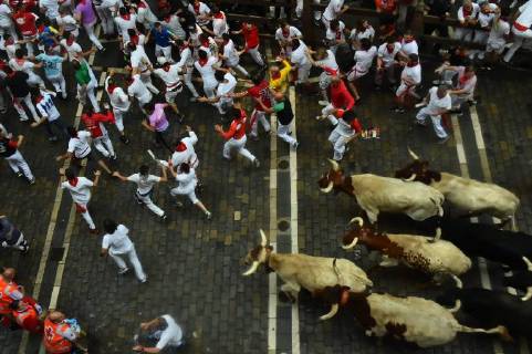 Participants run ahead of Puerto de San Lorenzo s fighting bulls on the first day of the San Fermin bull run festival in Pamplona Spain on July 7 2018 First run of the San Fermin fiestas with bulls of the Port of San Lorenzo on July 7, 2018 Oscar Zubiri Cordon Press  OscarxZubiri