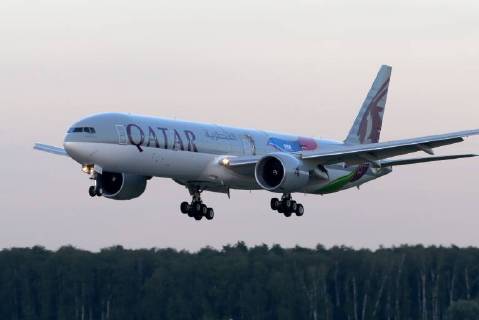 MOSCOW REGION, RUSSIA - JULY 9, 2018: A Boeing 777 jet airliner owned by Qatar Airways and painted in a new 2022 FIFA World Cup livery, makes a landing at Domodedovo International Airport. Marina Lystseva TASS  TS088C45