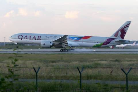 MOSCOW REGION, RUSSIA - JULY 9, 2018: A Boeing 777 jet airliner owned by Qatar Airways and painted in a new 2022 FIFA World Cup livery, makes a landing at Domodedovo International Airport. Marina Lystseva TASS  TS088C46