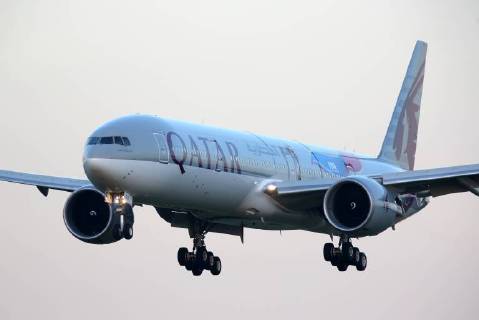 MOSCOW REGION, RUSSIA - JULY 9, 2018: A Boeing 777 jet airliner owned by Qatar Airways and painted in a new 2022 FIFA World Cup livery, makes a landing at Domodedovo International Airport. Marina Lystseva TASS  TS088C47