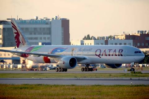 MOSCOW REGION, RUSSIA - JULY 9, 2018: A Boeing 777 jet airliner owned by Qatar Airways and painted in a new 2022 FIFA World Cup livery, makes a landing at Domodedovo International Airport. Marina Lystseva TASS  TS088C48