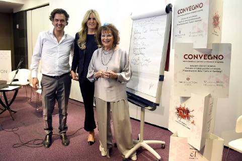 Taormina: Signing of the Taormina Charter for violence against women. In the picture: Claudia Cardinale with Tiziana Rocca signs the Charter of Taormina  Copyright: xMaurizioxD Avanzox xIPAx xMaurizioxDxAvanzox