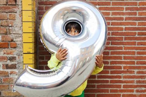 Portrait of boy with silver balloon model released Symbolfoto  VABF01614