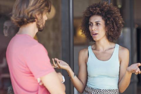 Couple discussing in the street model released Symbolfoto property released ZEF14194