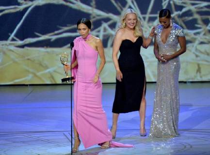 Elisabeth Moss (L) and Samira Wiley present the award to Thandie Newton onstage during the 70th annual Primetime Emmy Awards at the Microsoft Theater in downtown Los Angeles on September 17, 2018.  LAP201809171034 JIMxRUYMEN
