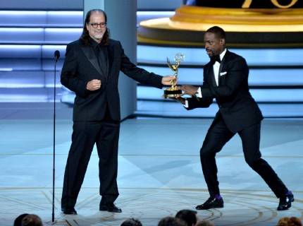 Glenn Weiss (L), winner of the Outstanding Directing for a Variety Special award for The Oscars and Sterling K. Brown appear onstage during the 70th annual Primetime Emmy Awards at the Microsoft Theater in downtown Los Angeles on September 17, 2018.  LAP201809171106 JIMxRUYMEN