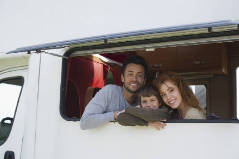 Parents and young boy in motor home, portrait  Copyright: FrédéricxCirou B78568810
