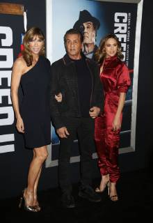 November 14, 2018 - New York City, New York, U.S. - Actor SYLVESTER STALLONE with (L) JENNIFER FLAVIN and daughter (R) SCARLET ROSE STALLONE attend the World Premiere of Creed ll held at the AMC Lincoln Square Theater. New York City U.S. - ZUMAk03_ 20181114_zaf_k03_174 Copyright: xNancyxKaszermanx