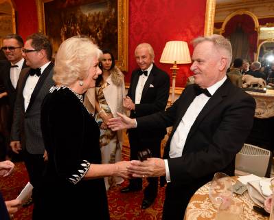 . 21 11 2018. London, United Kingdom. The Duchess of Cornwall is greeted by Lord Jeffrey Archer at a Julien MacDonald fashion show and reception at Lancaster House in London in aid of the National Osteoporosis Society charity  xPoolx xi-Imagesx IIM-18903-0009